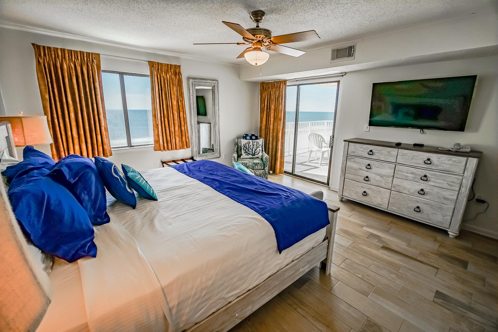 A beautiful master bedroom with an ocean view at VRI's Shoreline Towers in Gulf Shores, Alabama.